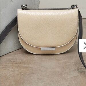 Leather crossbody half-moon bag. Brunello Cucinelli